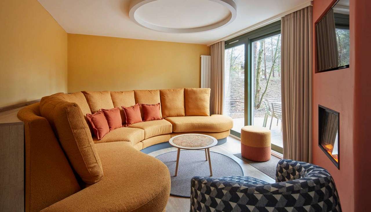 Living room in a 4 bedroom lodge at Elveden Forest.