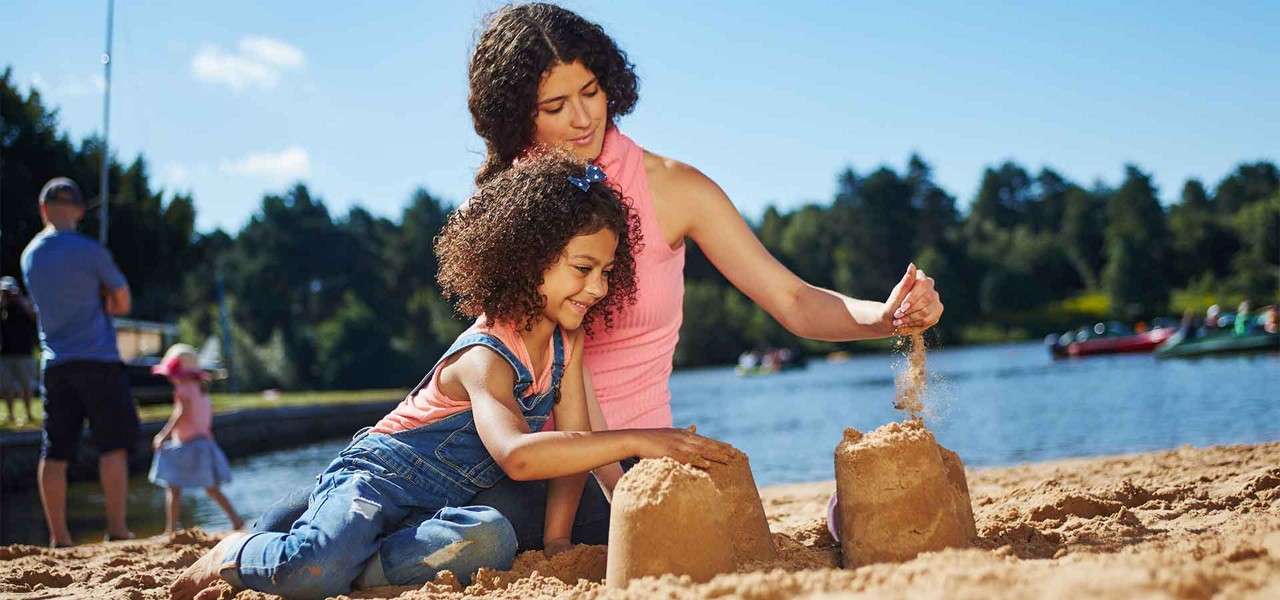 A mother and daughter on the beach