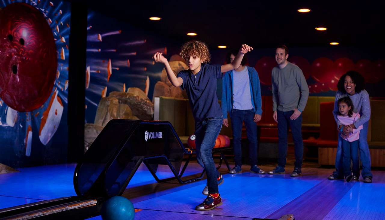 A family bowling together.