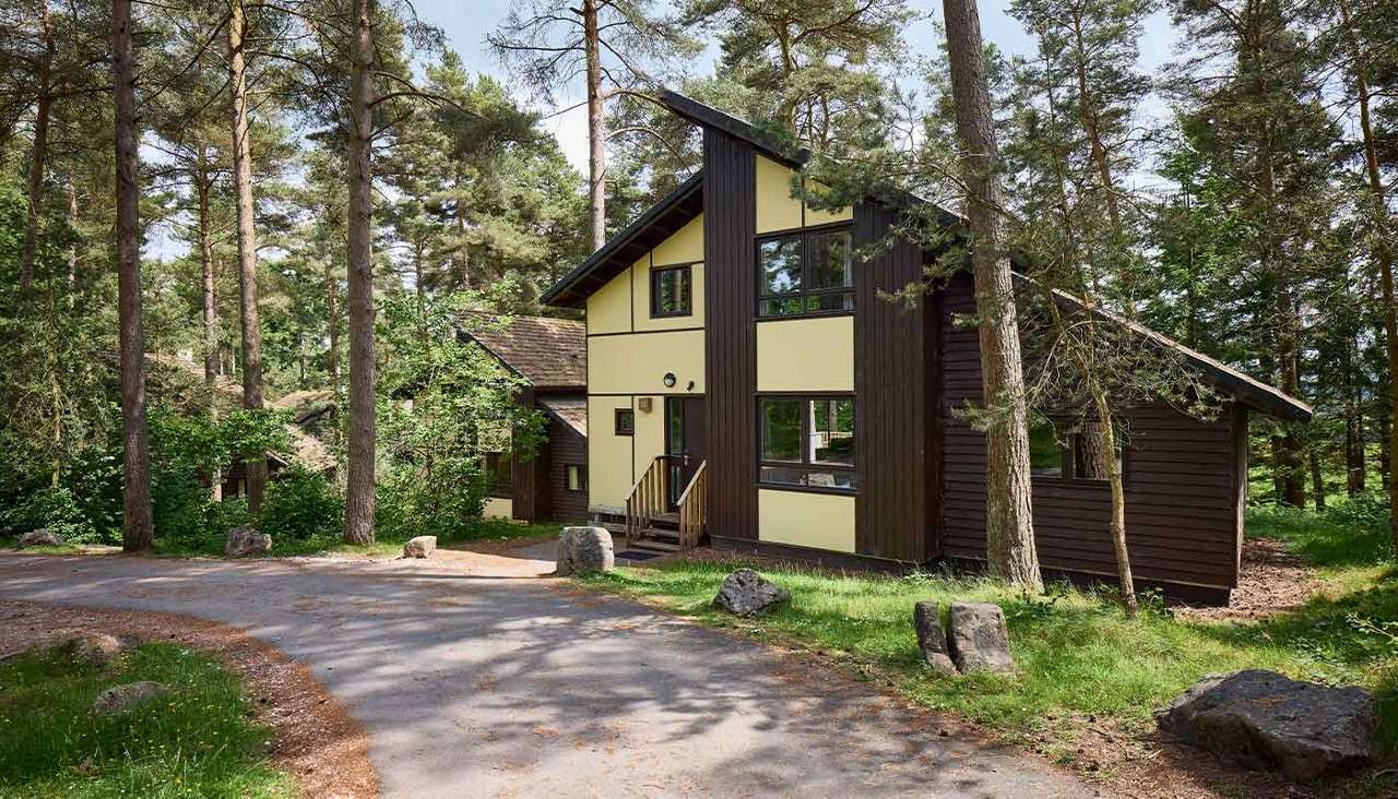Exterior shot of a Two-Storey Grand Forest Lodge.