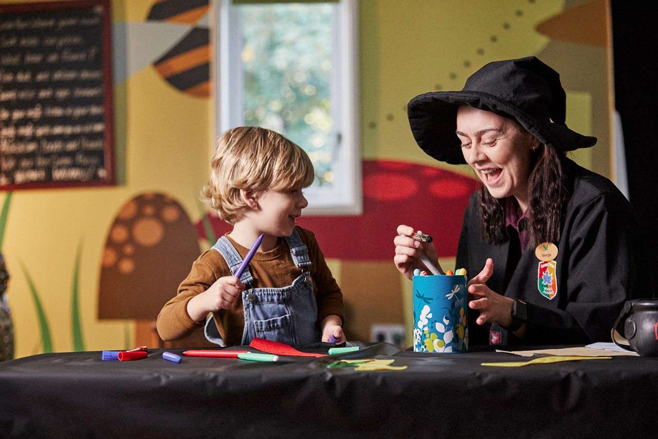 Young boy doing Wizard crafts.