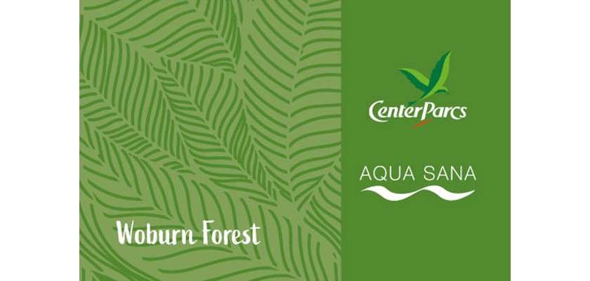 Brand panel displays text “Woburn Forest,” “CenterParcs,” “AQUA SANA,” with a leaf-shaped bird logo, on a green background featuring repeating leaf patterns.