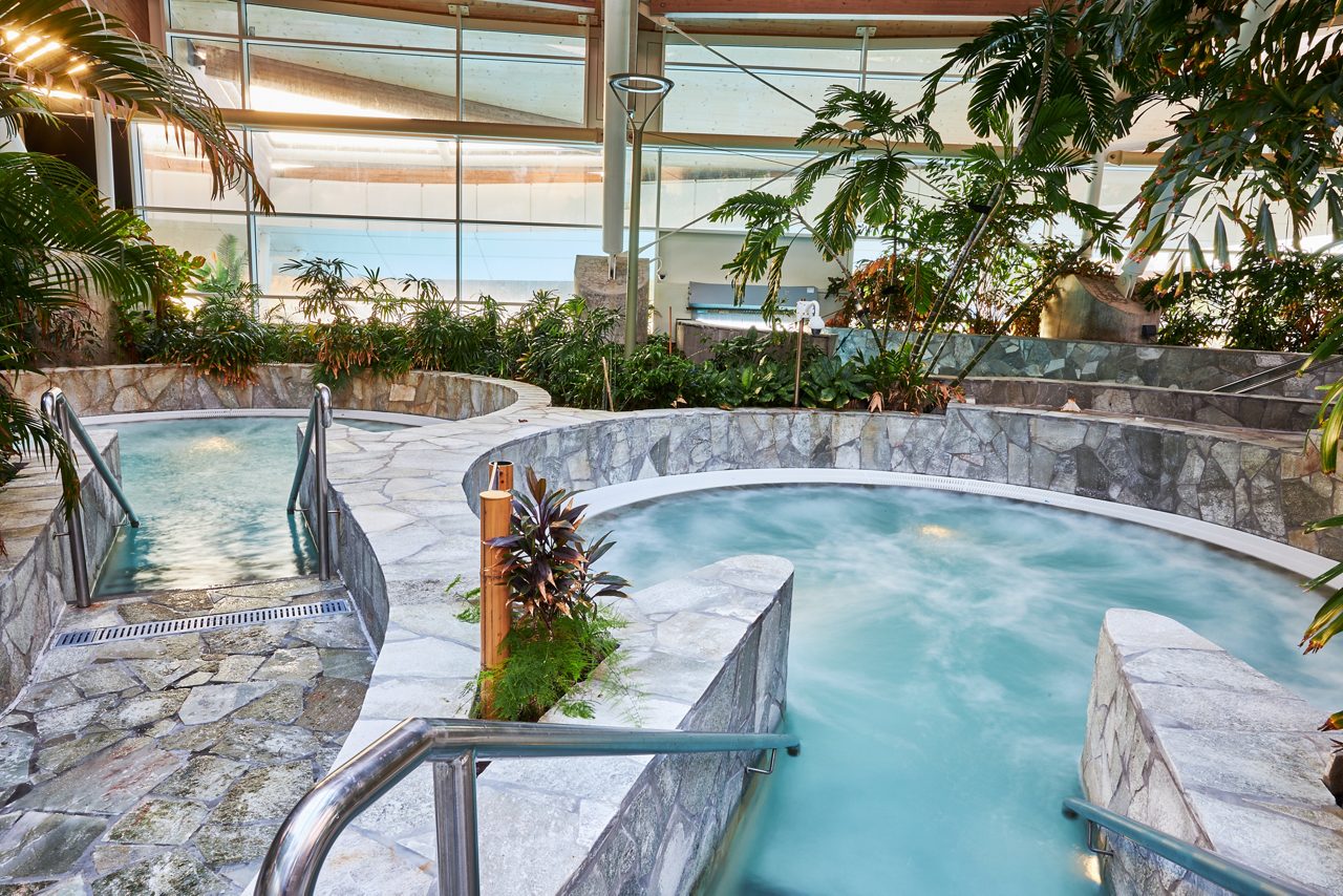 Bubbles swirling in a hot whirlpool.