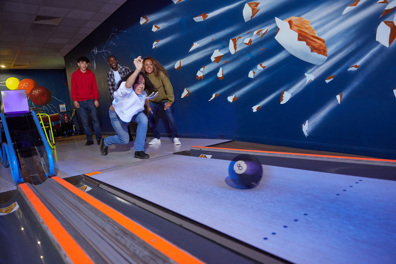 A family bowling together.