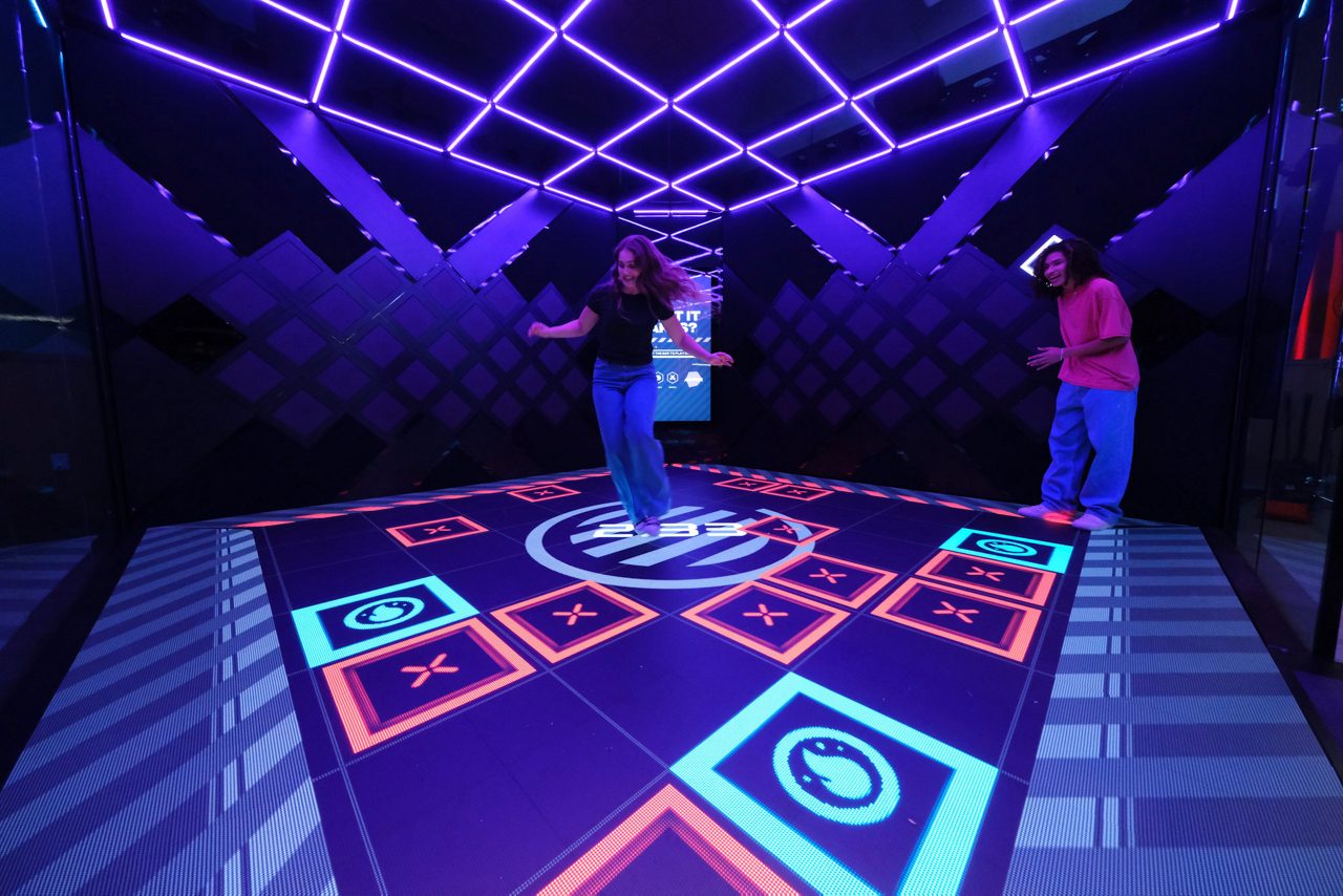 Three people taking part in Escape the Forest.